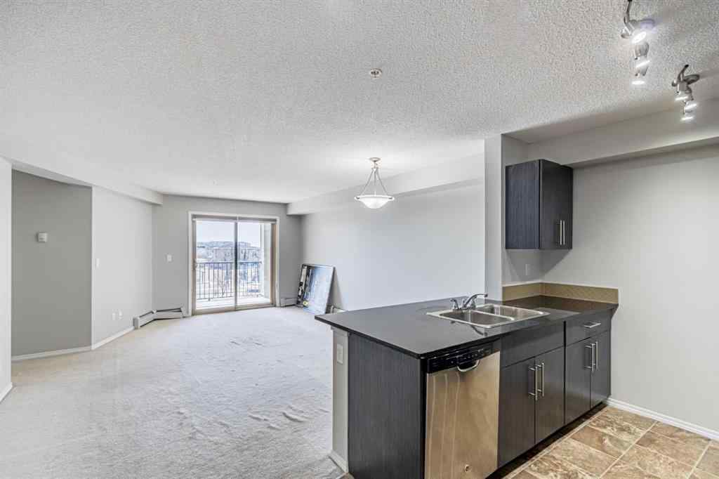 MLS® A2254654 - Unit #316 5 Saddlestone Way NE in Saddle Ridge Calgary, Residential
