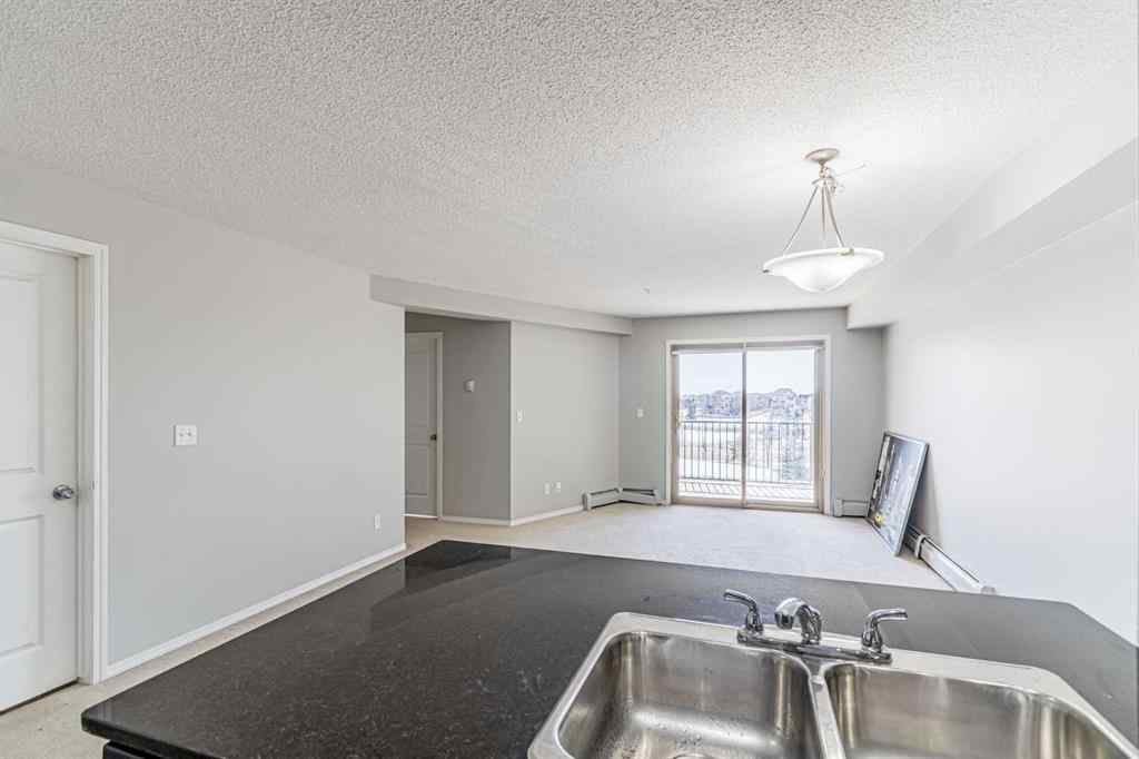 MLS® A2254654 - Unit #316 5 Saddlestone Way NE in Saddle Ridge Calgary, Residential
