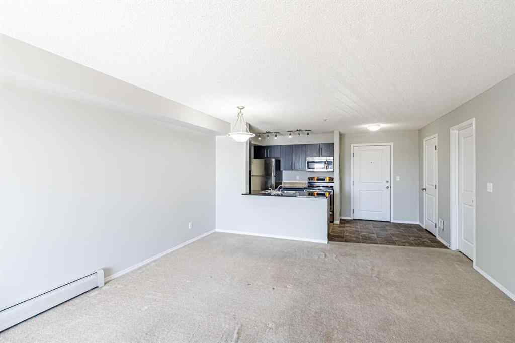 MLS® A2254654 - Unit #316 5 Saddlestone Way NE in Saddle Ridge Calgary, Residential