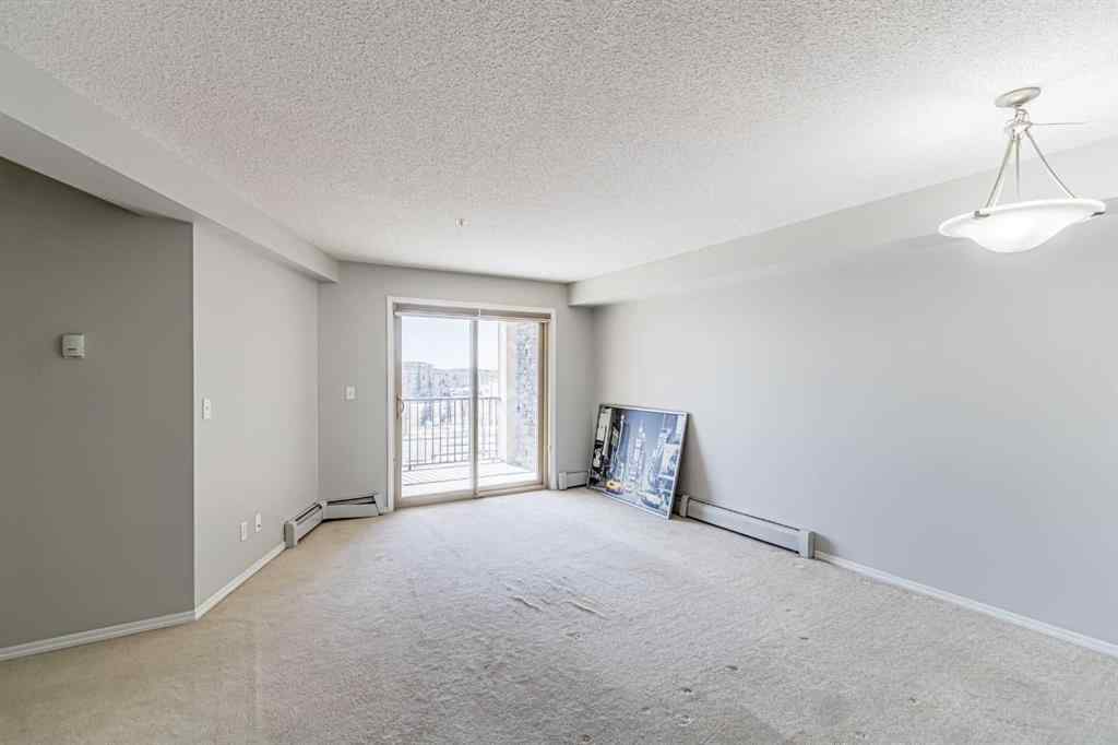 MLS® A2254654 - Unit #316 5 Saddlestone Way NE in Saddle Ridge Calgary, Residential
