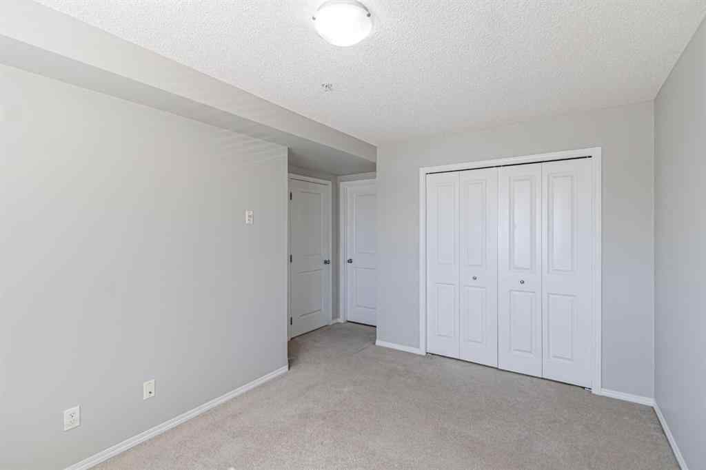 MLS® A2254654 - Unit #316 5 Saddlestone Way NE in Saddle Ridge Calgary, Residential