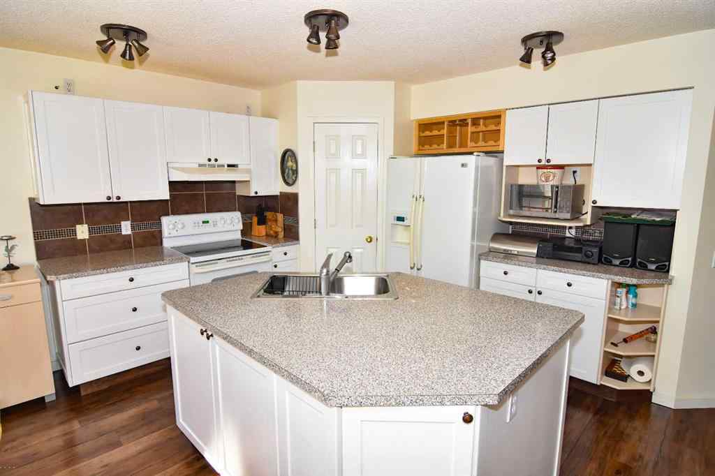 MLS® A2254665 - 14954 Mt Mckenzie Drive SE in McKenzie Lake Calgary, Residential