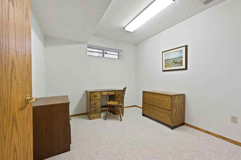 MLS® A2254677 - 127 Douglasbank Court SE in Douglasdale/Glen Calgary, Residential