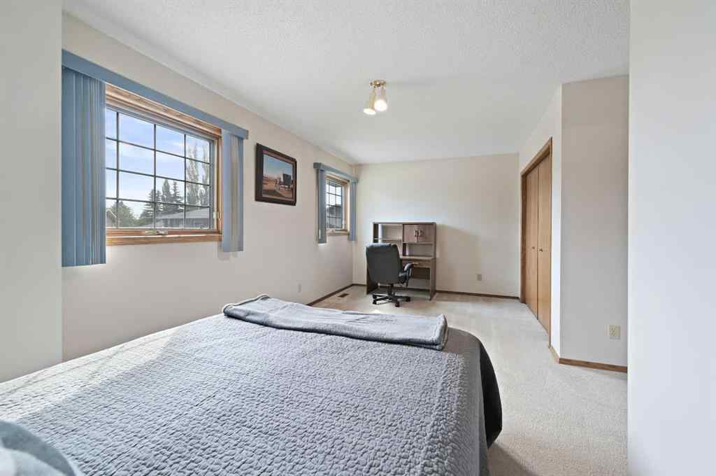 MLS® A2254677 - 127 Douglasbank Court SE in Douglasdale/Glen Calgary, Residential