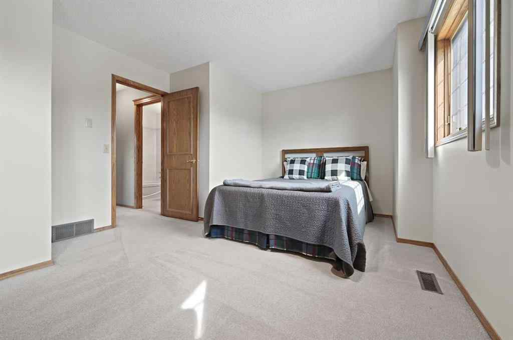 MLS® A2254677 - 127 Douglasbank Court SE in Douglasdale/Glen Calgary, Residential