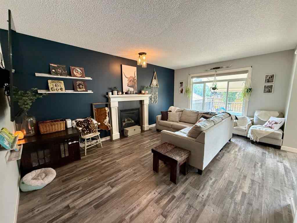MLS® A2254723 - 607 Montgomery Close SE in Montrose High River, Residential
