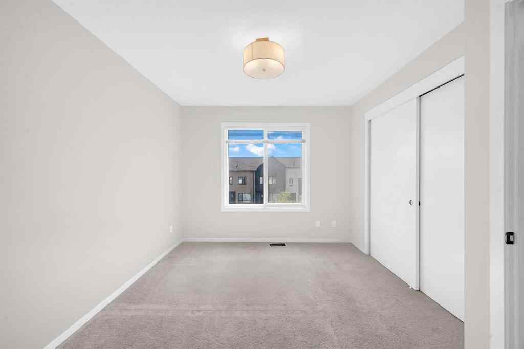 MLS® A2254738 - Unit #203 525 Redstone Walk NE in Redstone Calgary, Residential