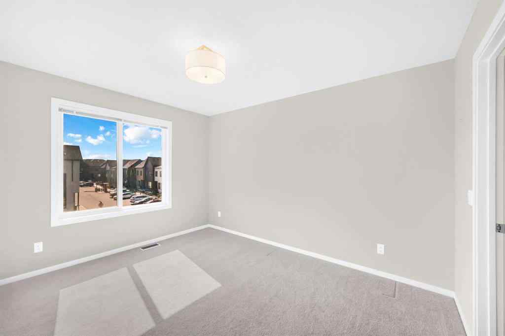 MLS® A2254738 - Unit #203 525 Redstone Walk NE in Redstone Calgary, Residential