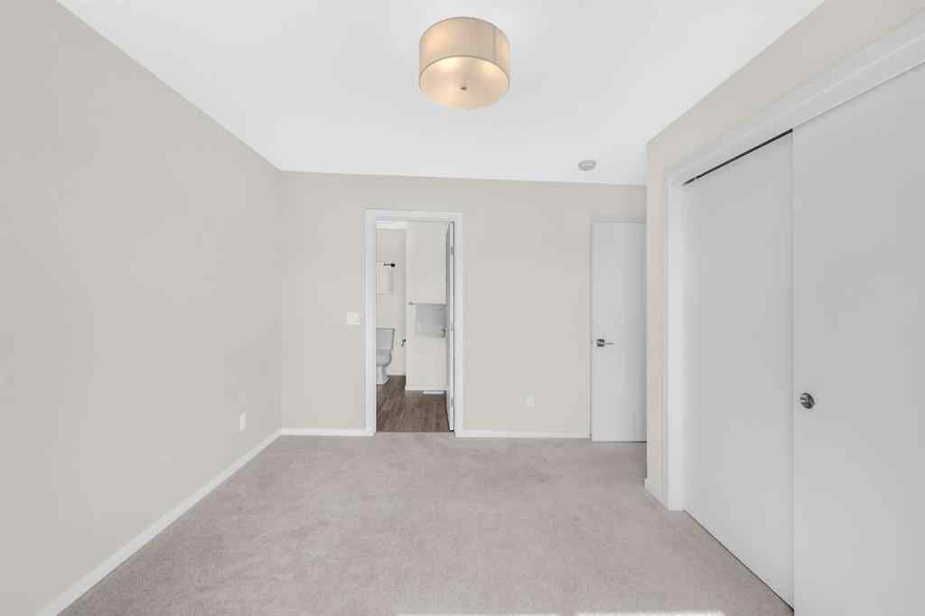 MLS® A2254738 - Unit #203 525 Redstone Walk NE in Redstone Calgary, Residential
