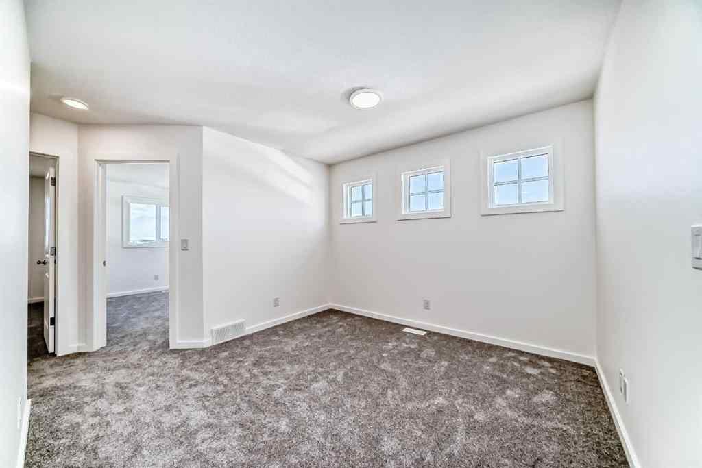MLS® A2254739 - 12 Starling Place NW in Moraine Calgary, Residential