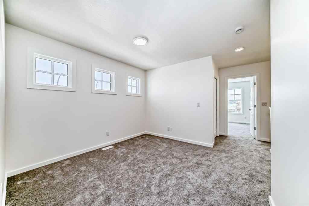 MLS® A2254739 - 12 Starling Place NW in Moraine Calgary, Residential