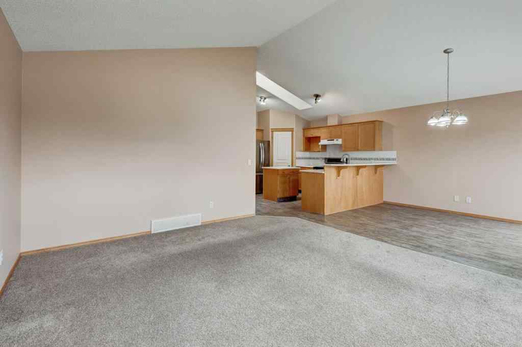 MLS® A2254749 - 90 West Springs Way SW in West Springs Calgary, Residential