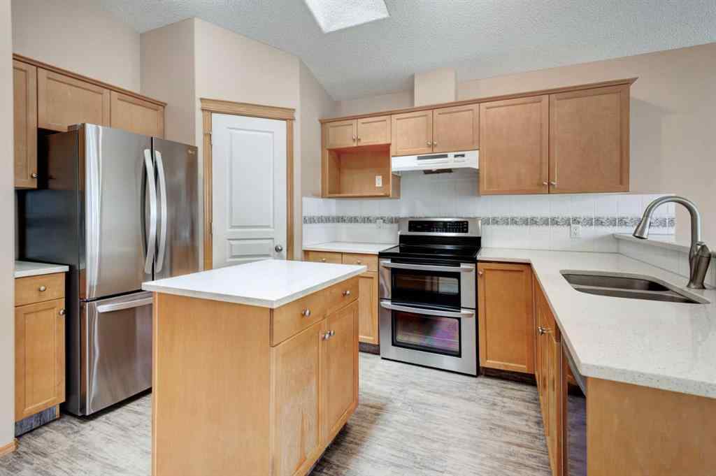 MLS® A2254749 - 90 West Springs Way SW in West Springs Calgary, Residential