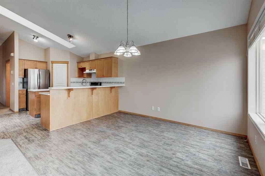 MLS® A2254749 - 90 West Springs Way SW in West Springs Calgary, Residential