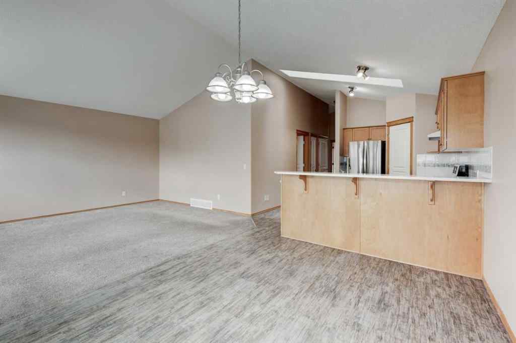 MLS® A2254749 - 90 West Springs Way SW in West Springs Calgary, Residential