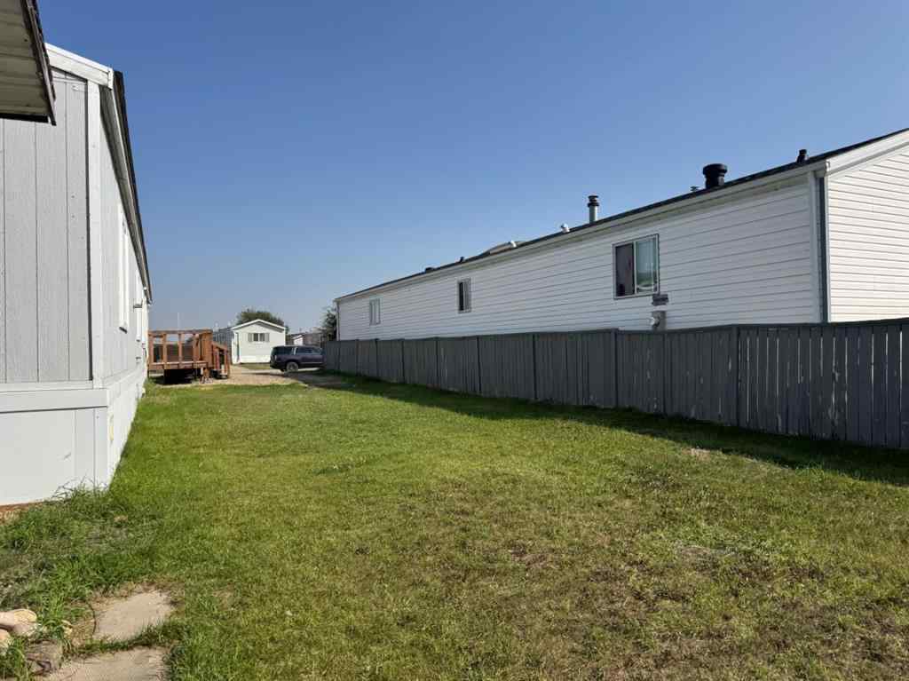 MLS® A2254771 - 9727 108 Avenue  in NONE Clairmont, Residential