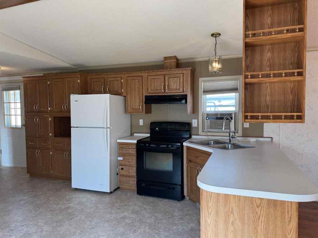 MLS® A2254771 - 9727 108 Avenue  in NONE Clairmont, Residential
