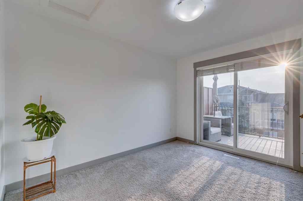 MLS® A2254800 - Unit #2 43 West Coach Manor SW in West Springs Calgary, Residential