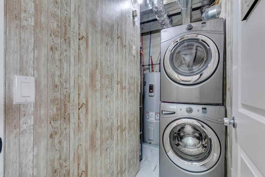 MLS® A2254800 - Unit #2 43 West Coach Manor SW in West Springs Calgary, Residential