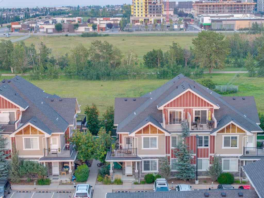 MLS® A2254800 - Unit #2 43 West Coach Manor SW in West Springs Calgary, Residential