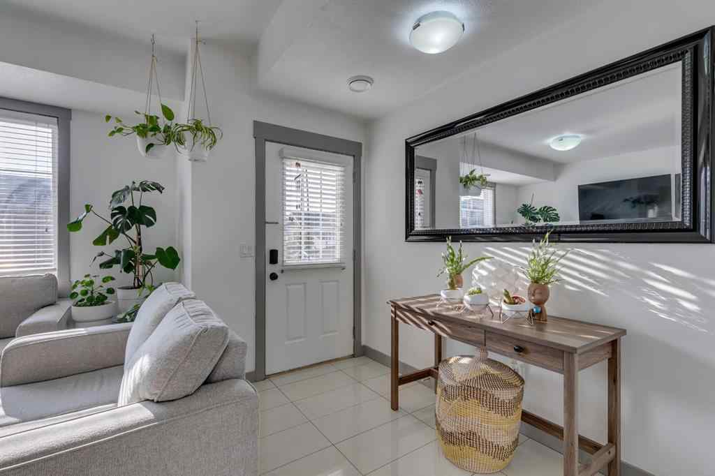 MLS® A2254800 - Unit #2 43 West Coach Manor SW in West Springs Calgary, Residential