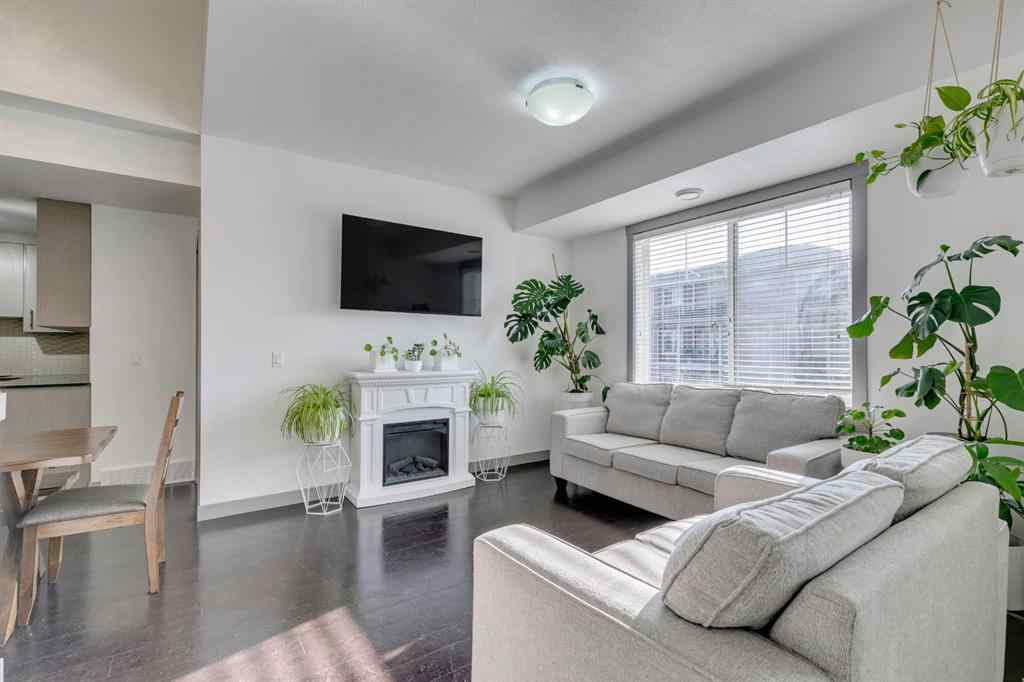 MLS® A2254800 - Unit #2 43 West Coach Manor SW in West Springs Calgary, Residential