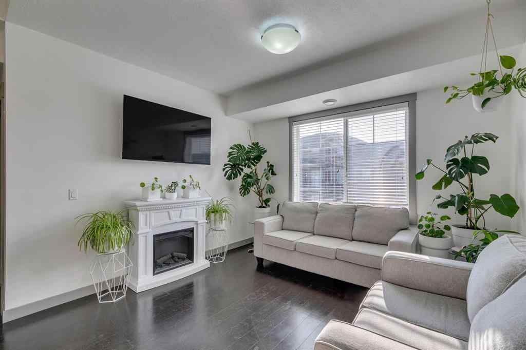 MLS® A2254800 - Unit #2 43 West Coach Manor SW in West Springs Calgary, Residential