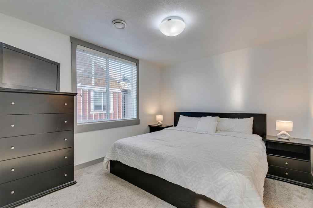 MLS® A2254800 - Unit #2 43 West Coach Manor SW in West Springs Calgary, Residential