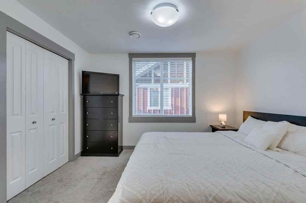 MLS® A2254800 - Unit #2 43 West Coach Manor SW in West Springs Calgary, Residential