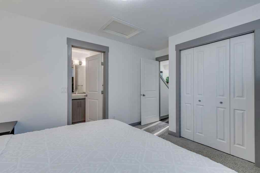 MLS® A2254800 - Unit #2 43 West Coach Manor SW in West Springs Calgary, Residential