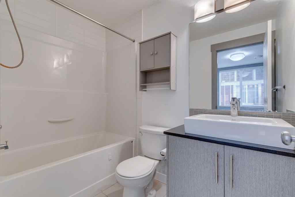 MLS® A2254800 - Unit #2 43 West Coach Manor SW in West Springs Calgary, Residential