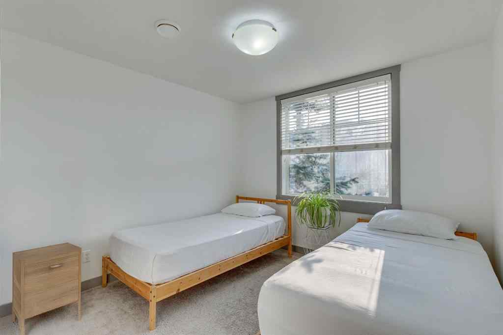 MLS® A2254800 - Unit #2 43 West Coach Manor SW in West Springs Calgary, Residential