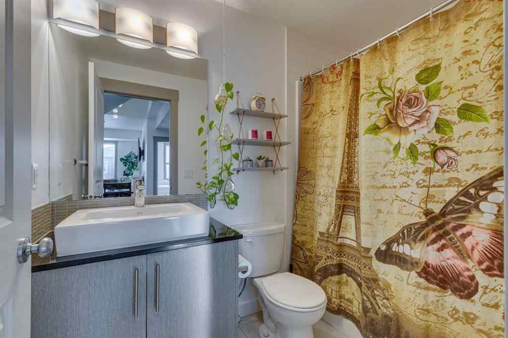 MLS® A2254800 - Unit #2 43 West Coach Manor SW in West Springs Calgary, Residential