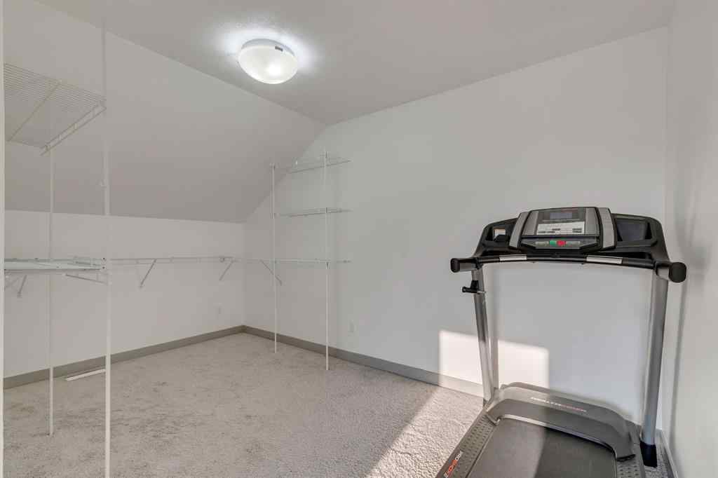 MLS® A2254800 - Unit #2 43 West Coach Manor SW in West Springs Calgary, Residential