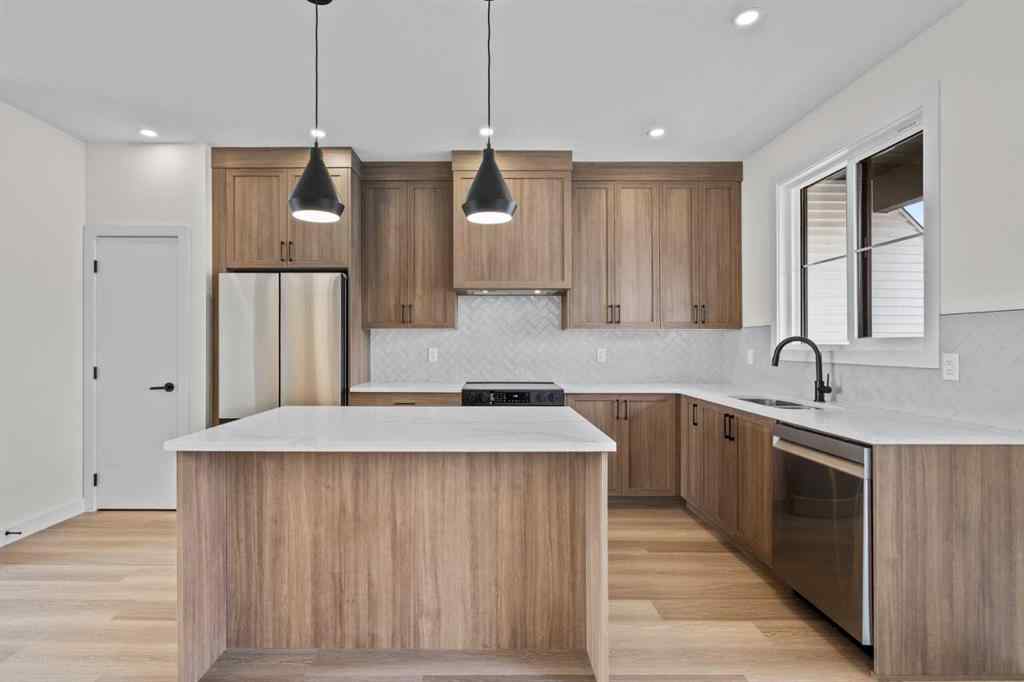MLS® A2254811 - Unit #1205 201 Cooperswood Green S in Coopers Crossing Airdrie, Residential
