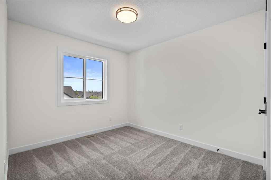 MLS® A2254811 - Unit #1205 201 Cooperswood Green S in Coopers Crossing Airdrie, Residential