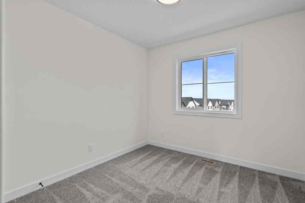 MLS® A2254811 - Unit #1205 201 Cooperswood Green S in Coopers Crossing Airdrie, Residential