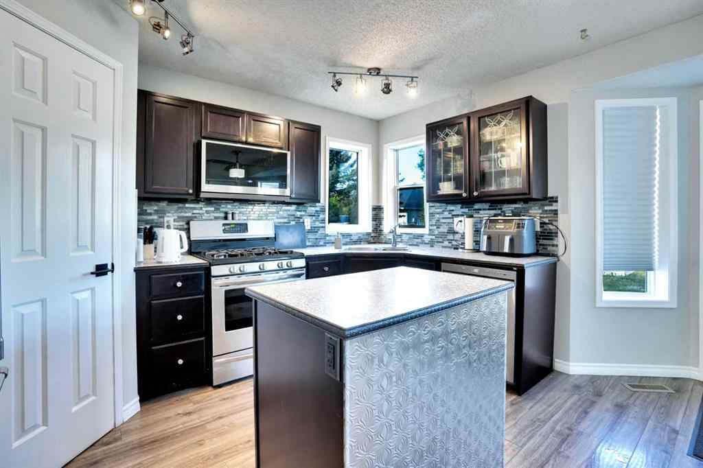 MLS® A2254815 - 8 Woodside Circle NW in Woodside Airdrie, Residential