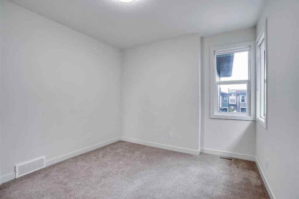 MLS® A2254833 - Unit #106 116 Saddlestone Heath NE in Saddle Ridge Calgary, Residential