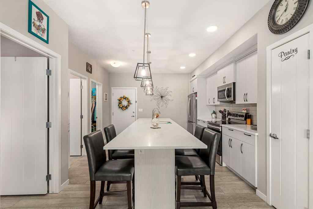 MLS® A2254842 - Unit #113 370 Harvest Hills Common NE in Harvest Hills Calgary, Residential