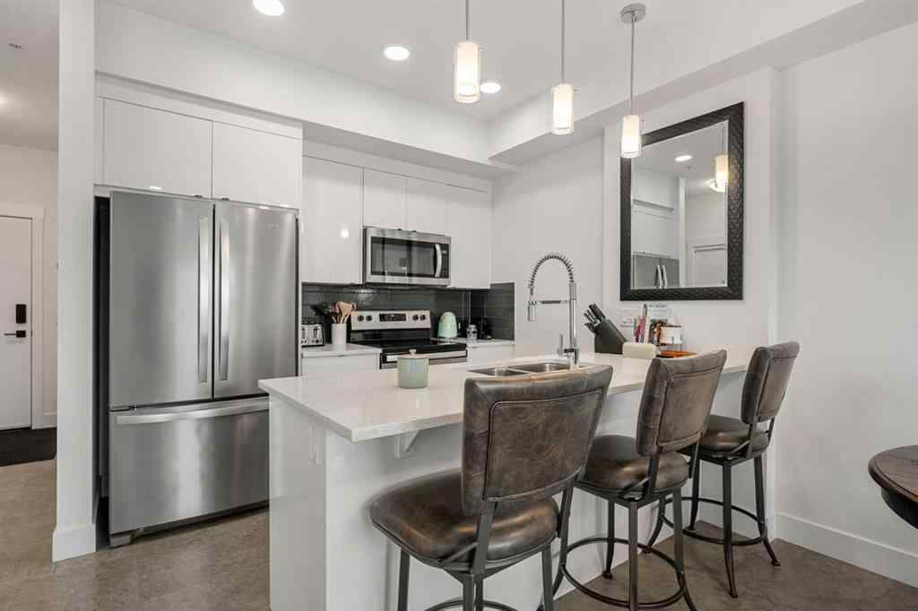MLS® A2254860 - Unit #411 19621 40 Street SE in Seton Calgary, Residential