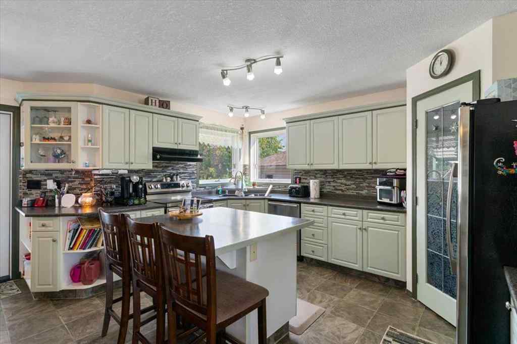 MLS® A2254889 - 9372 71 Avenue  in South Patterson Place Grande Prairie, Residential