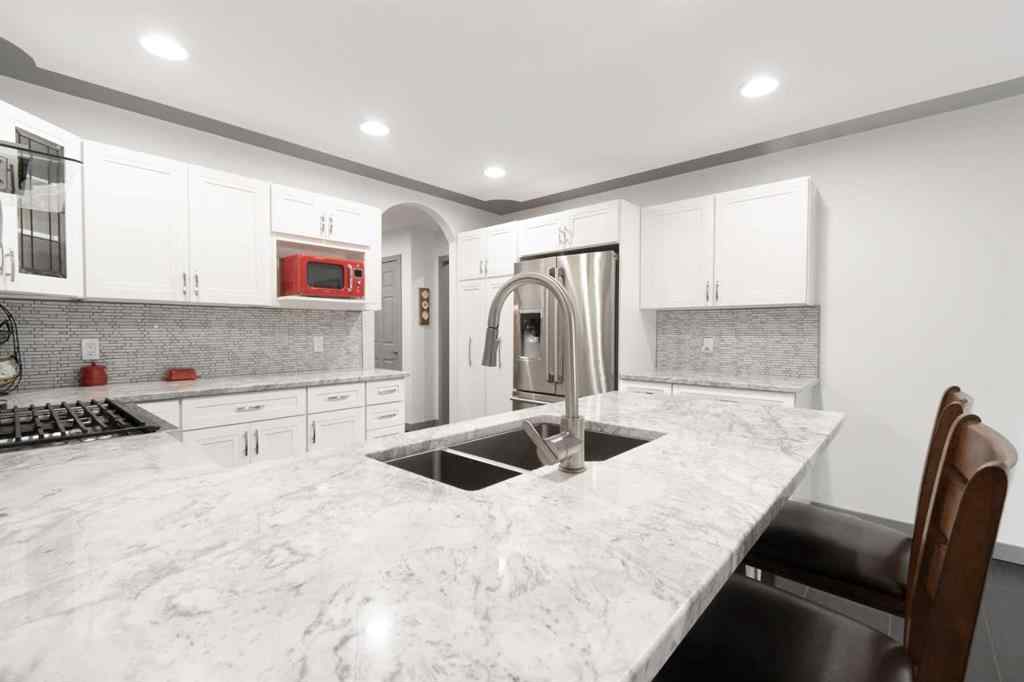 MLS® A2254904 - 9646 Wedgewood Drive S in Wedgewood Wedgewood, Residential