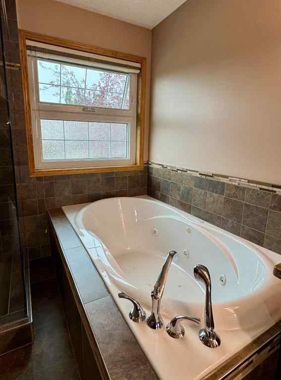 MLS® A2254907 - 111 Edgeridge Circle NW in Edgemont Calgary, Residential