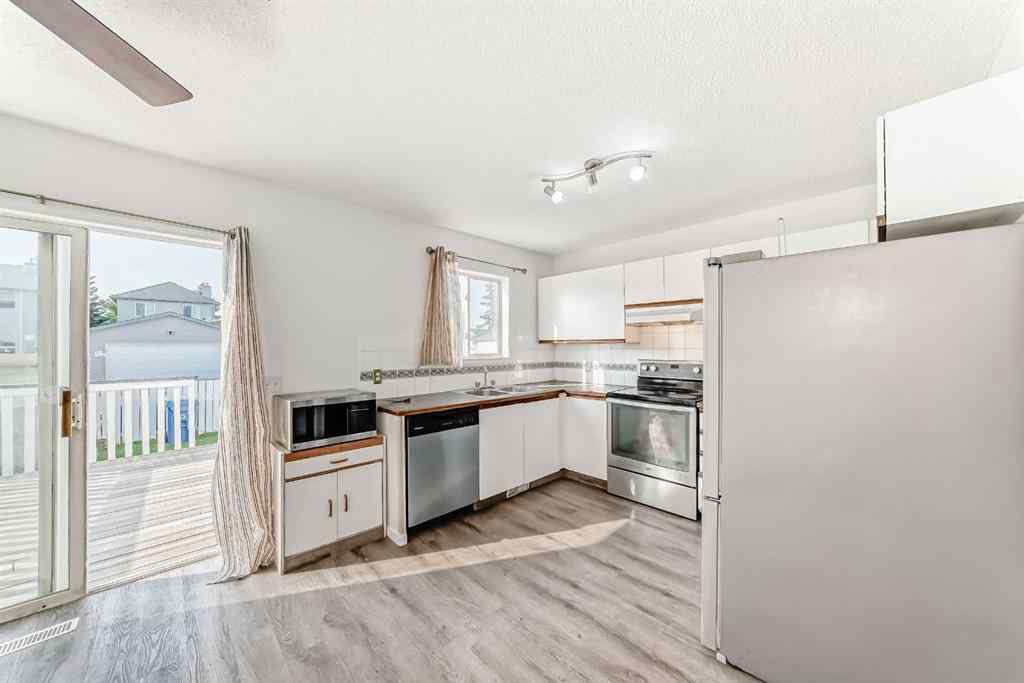 MLS® A2254933 - 5215 Martin Crossing Drive NE in Martindale Calgary, Residential