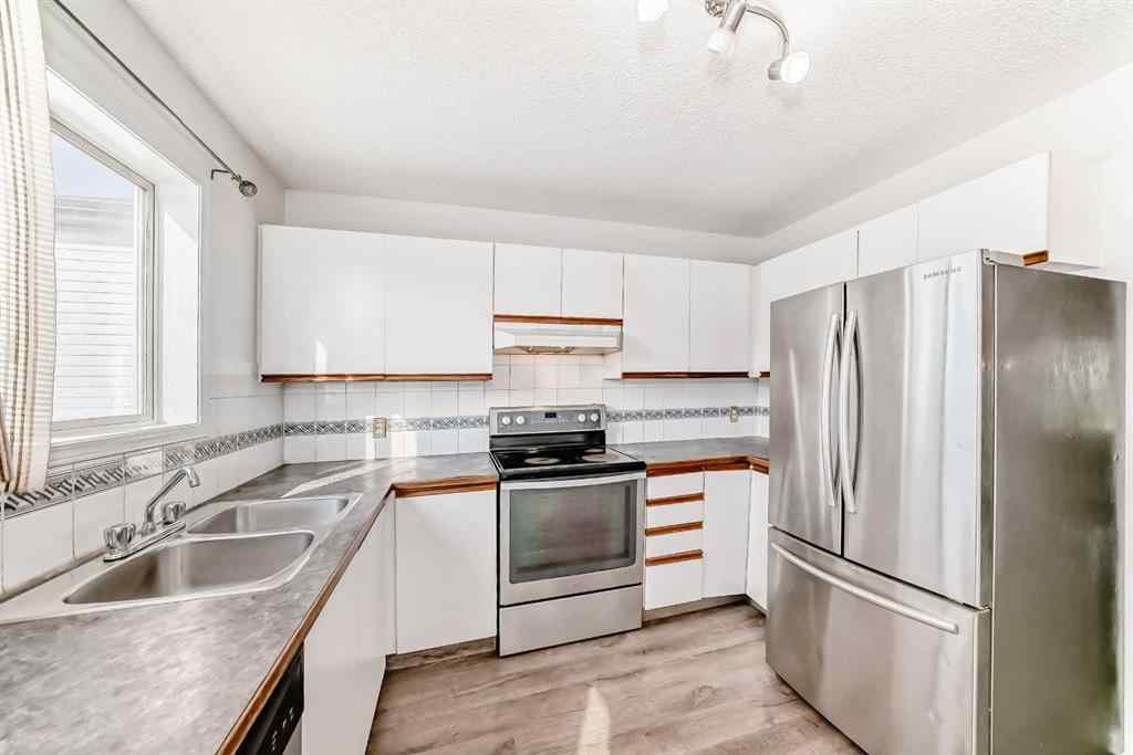 MLS® A2254933 - 5215 Martin Crossing Drive NE in Martindale Calgary, Residential