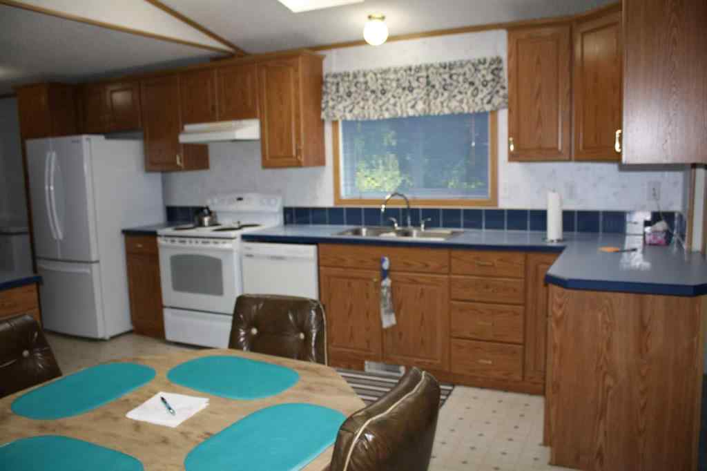 MLS® A2254946 - Unit #56 6724 17 Avenue SE in Red Carpet Calgary, Mobile
