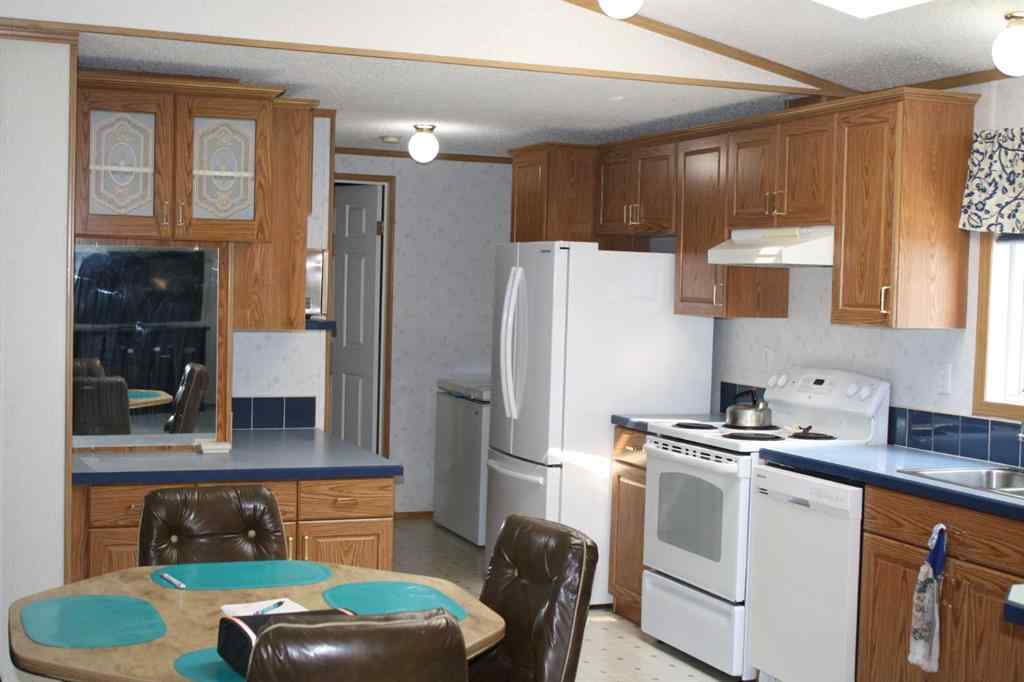 MLS® A2254946 - Unit #56 6724 17 Avenue SE in Red Carpet Calgary, Mobile