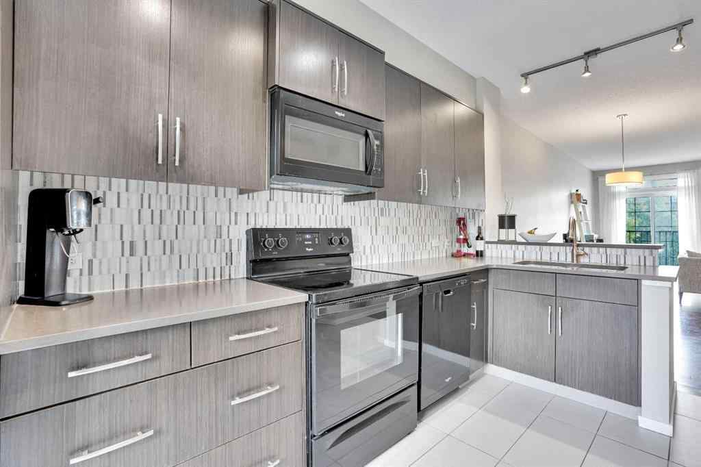 MLS® A2254995 - 306 Ascot Circle SW in Aspen Woods Calgary, Residential