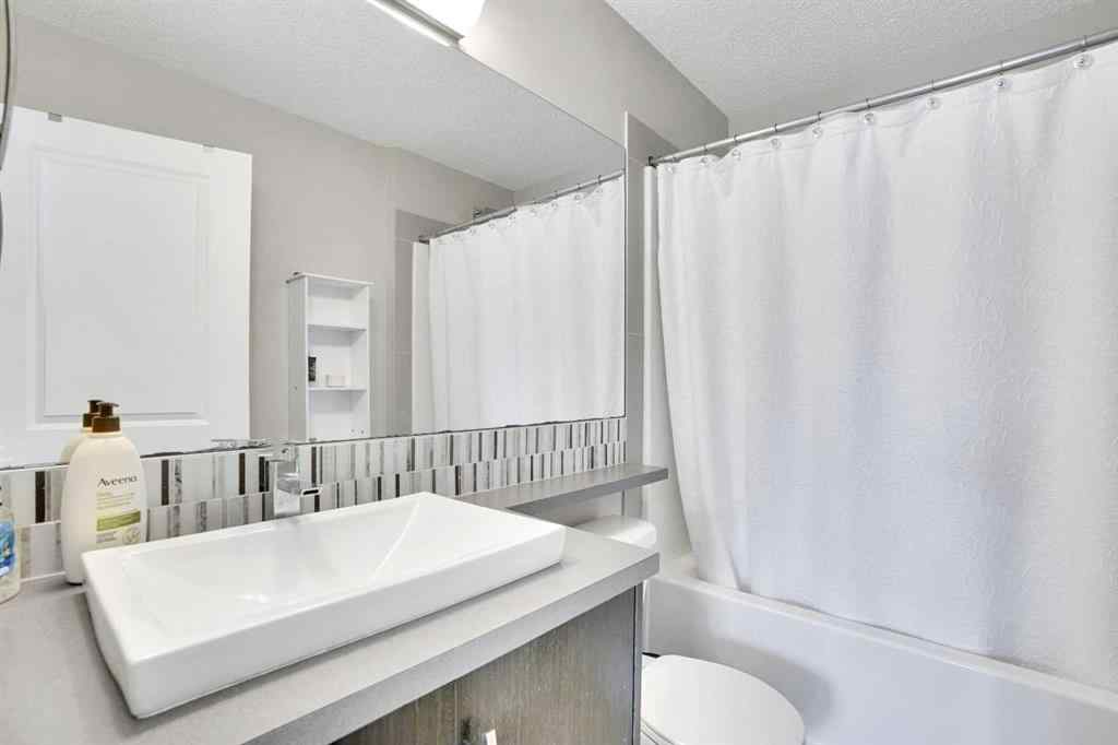 MLS® A2254995 - 306 Ascot Circle SW in Aspen Woods Calgary, Residential